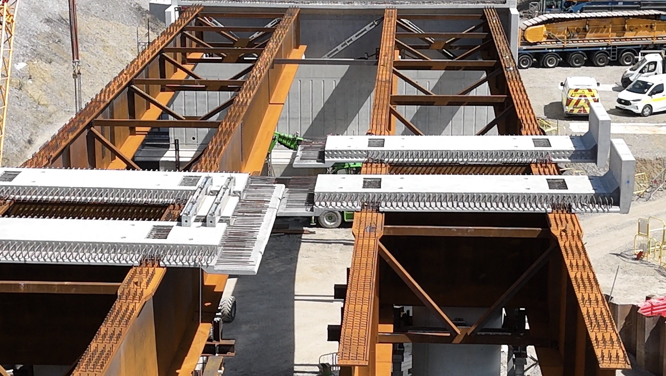 Precast concrete deck slabs being installed across the Baker Viaduct steel girders