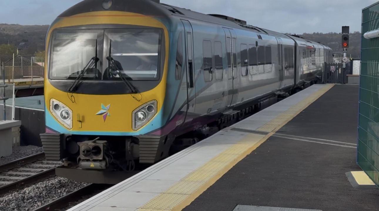 TransPennine Express Class 185s 185129 and 185151 coupled together arriving into Huddersfield with a service to Manchester Airport
