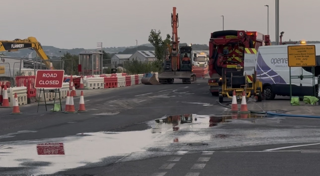 Leeds Road Overbridge on the A62, with construction activity visible alongside the existing highway structure